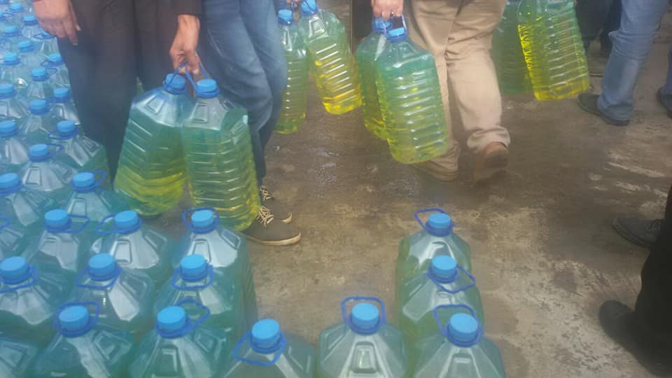 توزيع مادة المازوت على 200 عائلة فلسطينية سورية في البقاع اللبناني 