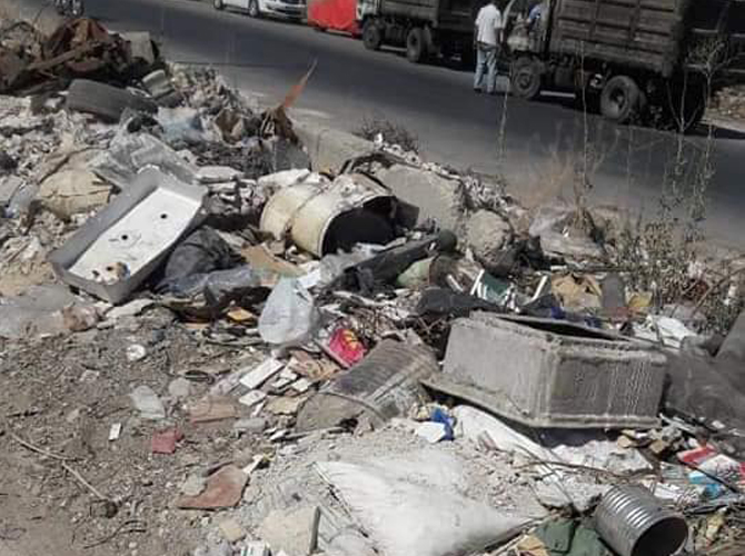 شكوى من تراكم القمامة في مدخل مخيّم جرمانا 