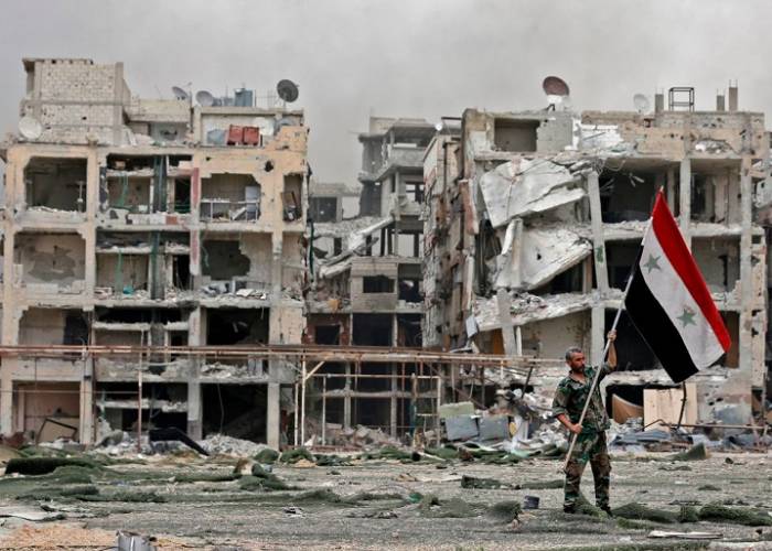 عناصر موالية للنظام تضع يدها بالقوة على منازل في مخيم سبينة