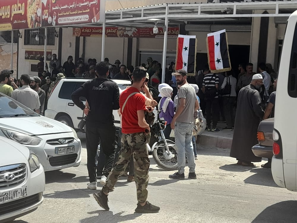 بعد الحصار والقصف اتفاق تسوية يشمل أربعة فلسطينيين من أبناء مخيم درعا