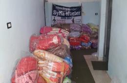 توزيع بعض المساعدات على العائلات الفلسطينية جنوب سورية