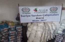 هيئة فلسطين الخيرية توزع مساعداتها جنوب سورية