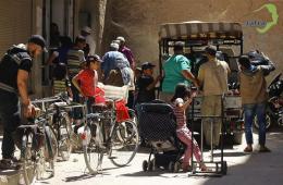 توزيع سلل غذائية على أهالي مخيم اليرموك جنوب دمشق