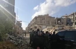 وفد رسمي يدخل حي الحجر الأسود ويعد بتسهيل عودة المهجرين