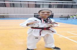 طفلة فلسطينية تحرز ذهبيتين وتفوز ببطولة الجمهورية