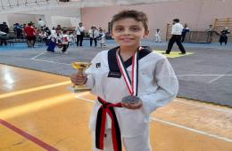 طفل فلسطيني بطلاً لسورية في لعبة التايكواندو للأشبال 