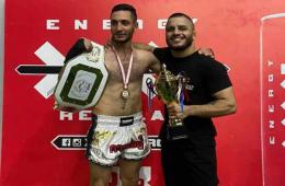 فلسطيني يتوج بذهبية الكيك بوكسينغ ويهديها لغزة