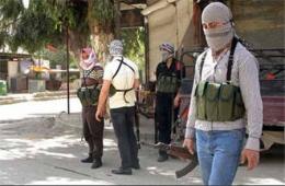 شاب فلسطيني يقضي بأحداث الحرب الدائرة في سوريا 