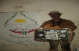 هيئة علماء فلسطين في الخارج توزع المساعدات في مخيم اليرموك 